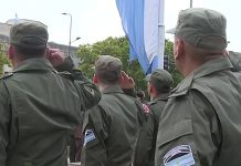 Nahuel Gallo participó del izamiento de la bandera nacional en el edificio de Gendarmería